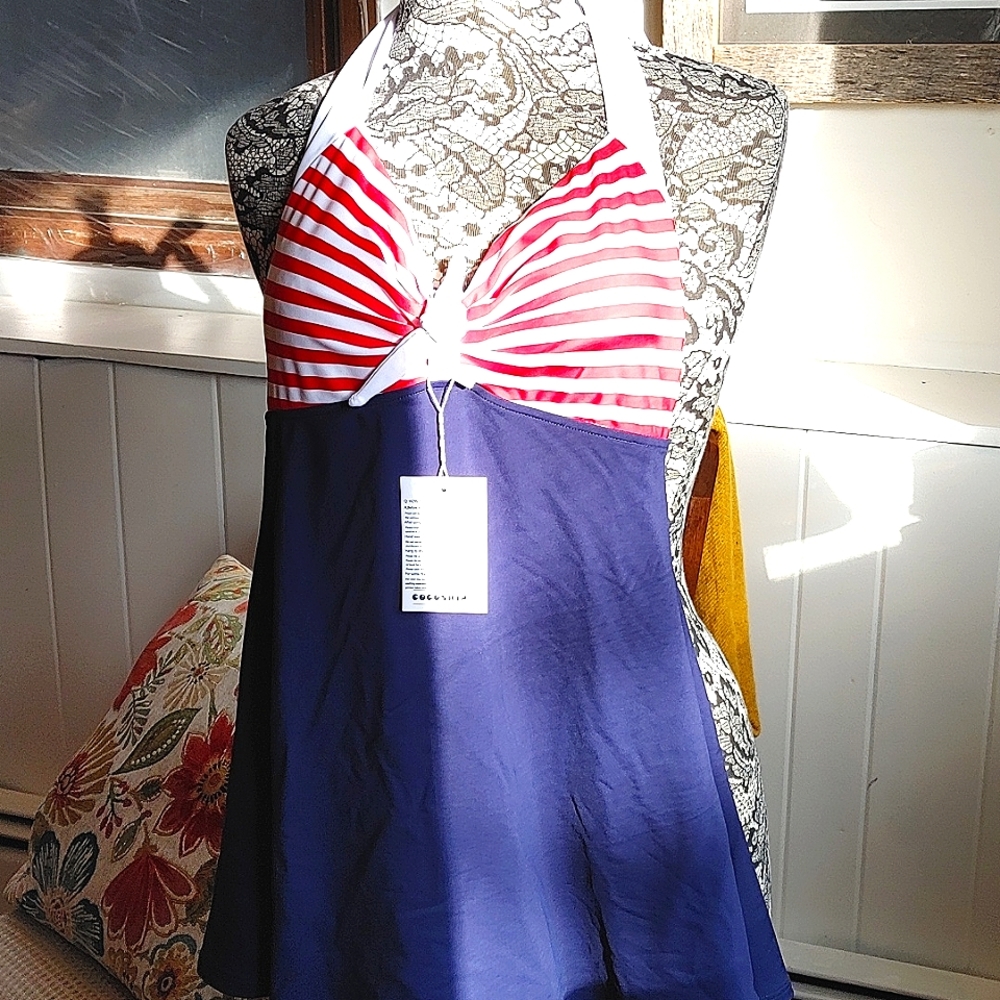 Navy, red and white skirted suit with shorts underneath